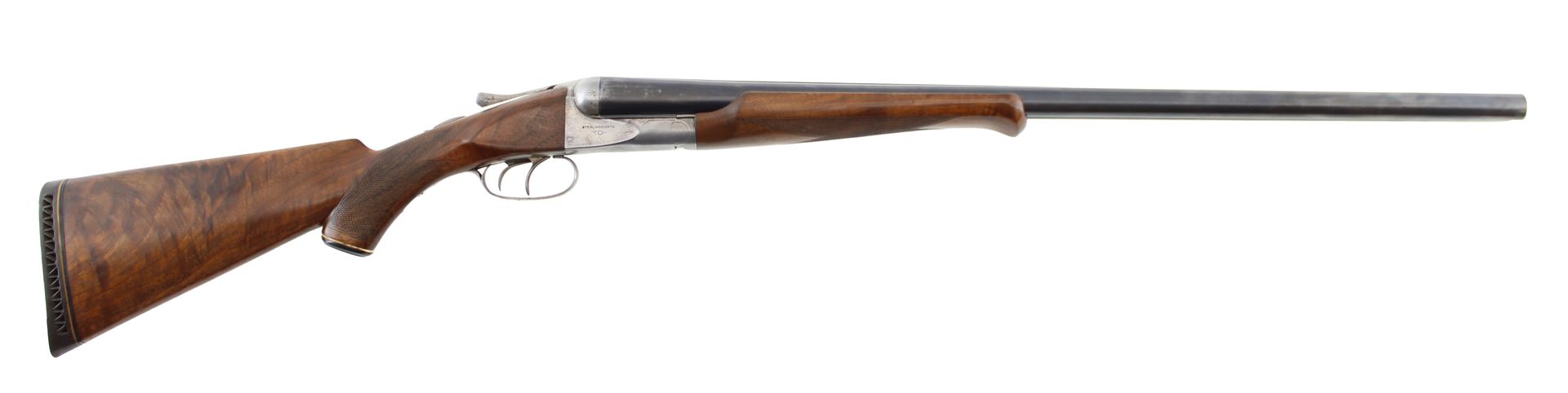 Wooden-stock rifle with long barrel isolated on a white background