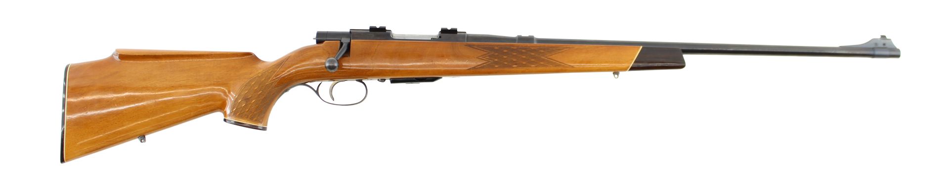 Wooden-stock rifle with a long barrel, shown in side view on a white background