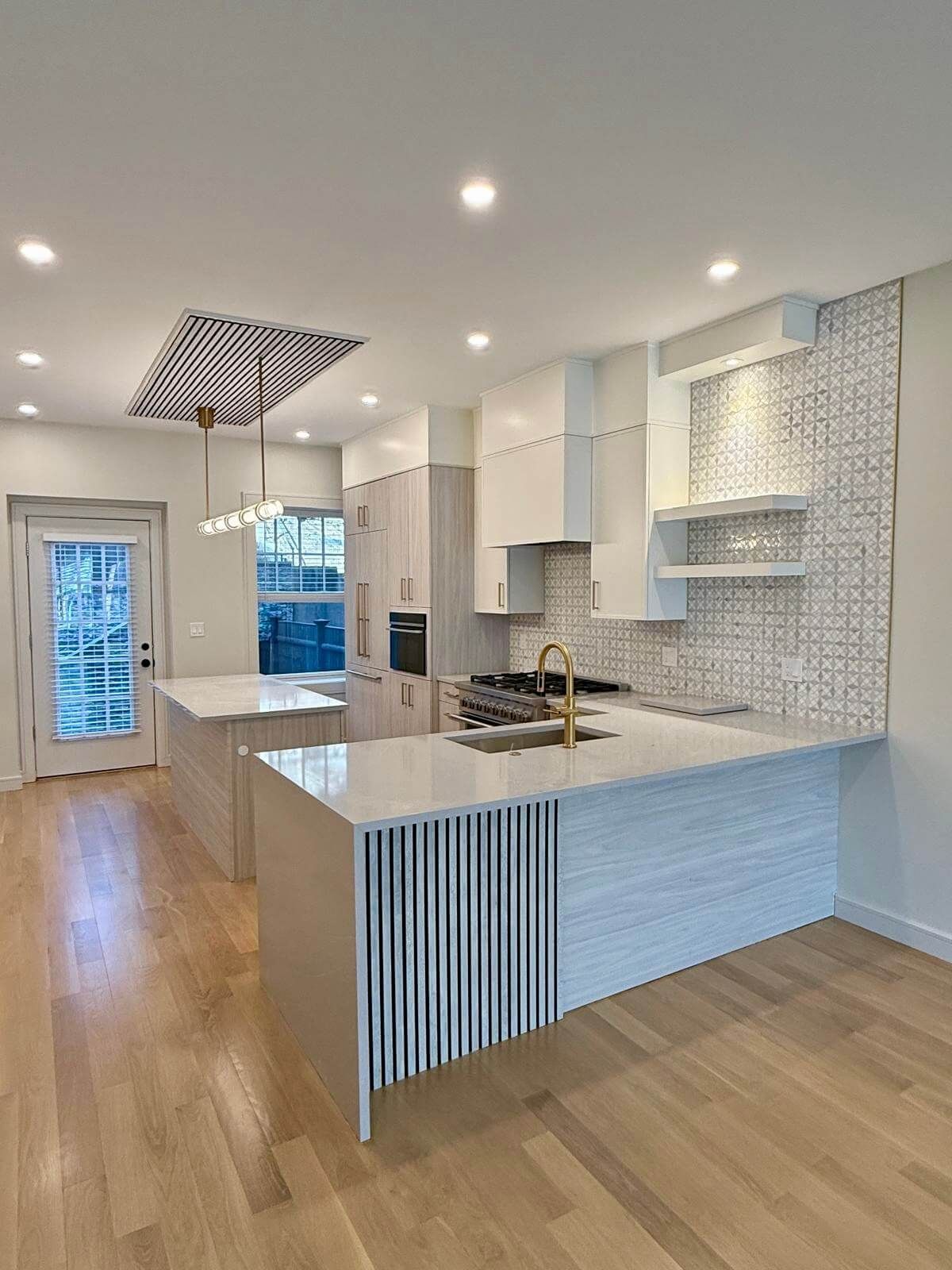Contemporary Kitchen Remodel by Buloke Construction Group Inc. project photo