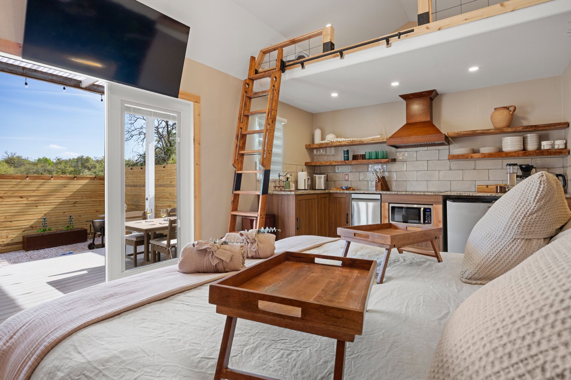 King bed in the lofted suite inside Alebrije cabin, the most secluded cabin at Avandaro Ranch