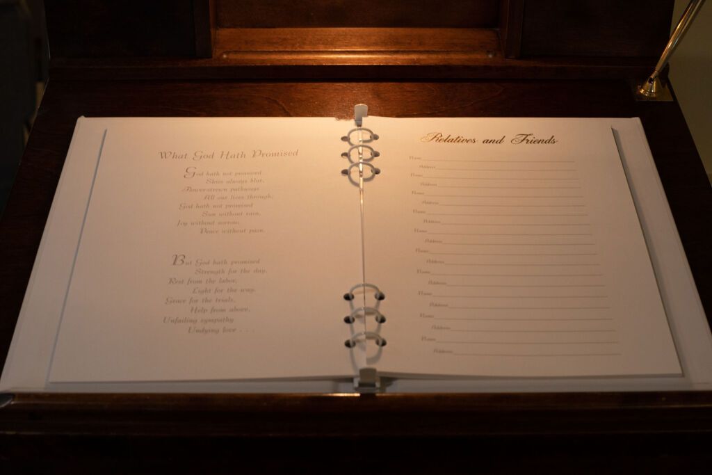 Open book in wooden frame, with 