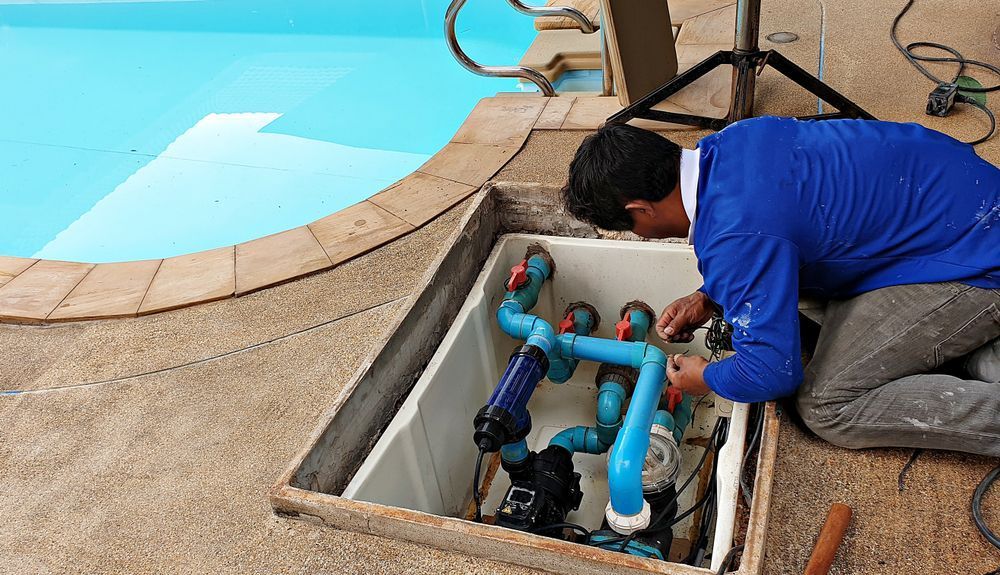 Technician Fixing Swimming Pool Using Water Pump — Pool & Spa Doctor in Alice Springs, NT