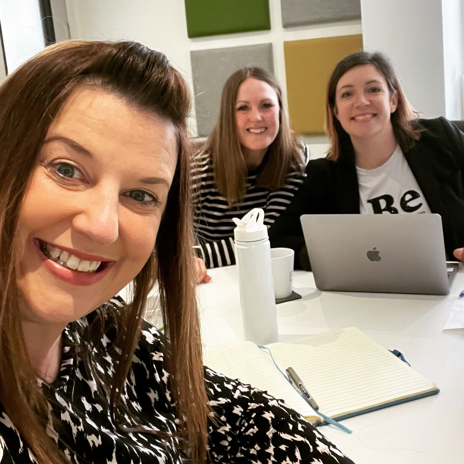 three women smiling
