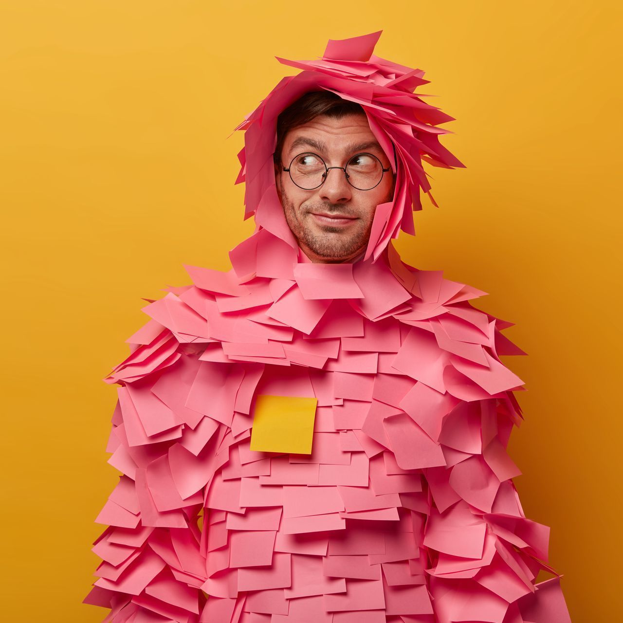 Man covered in post it notes