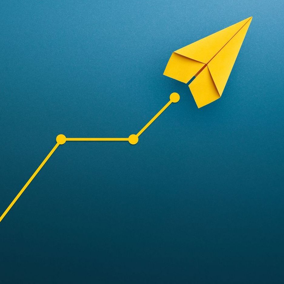 Graph with a paper plan at the top