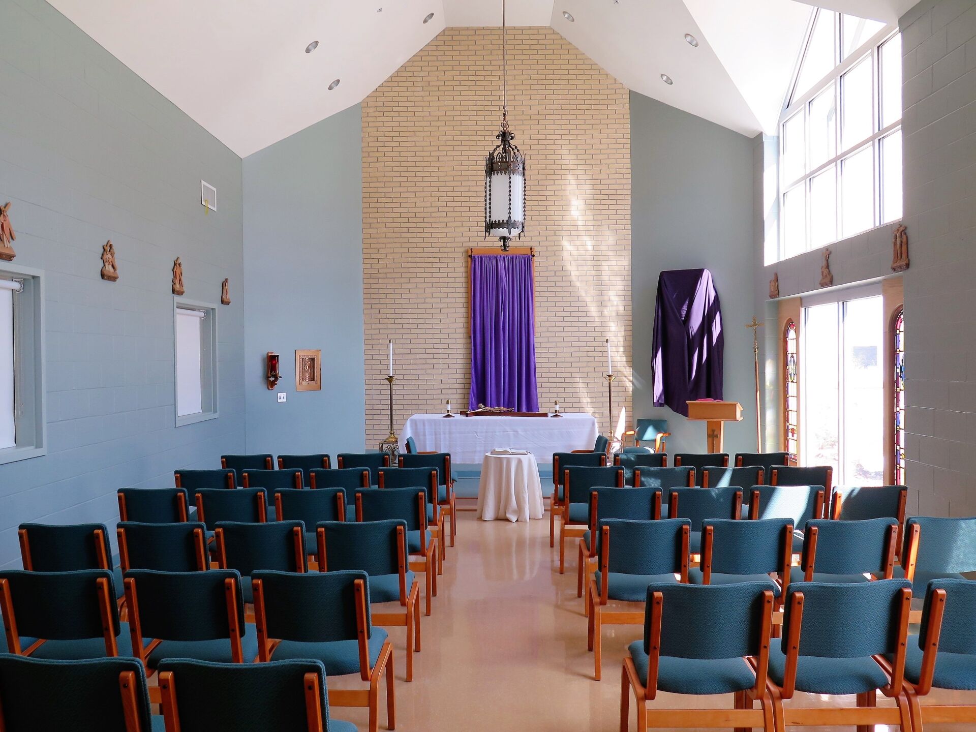 empty champel in the school with alter and chairs