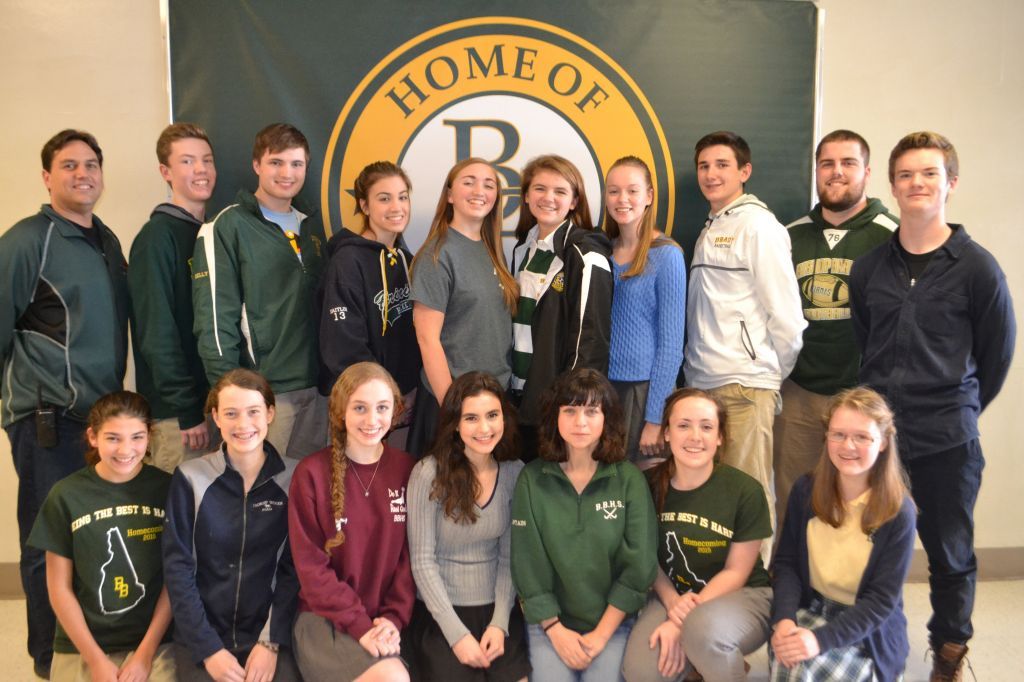 group of students in font of a brady banner in the hallway