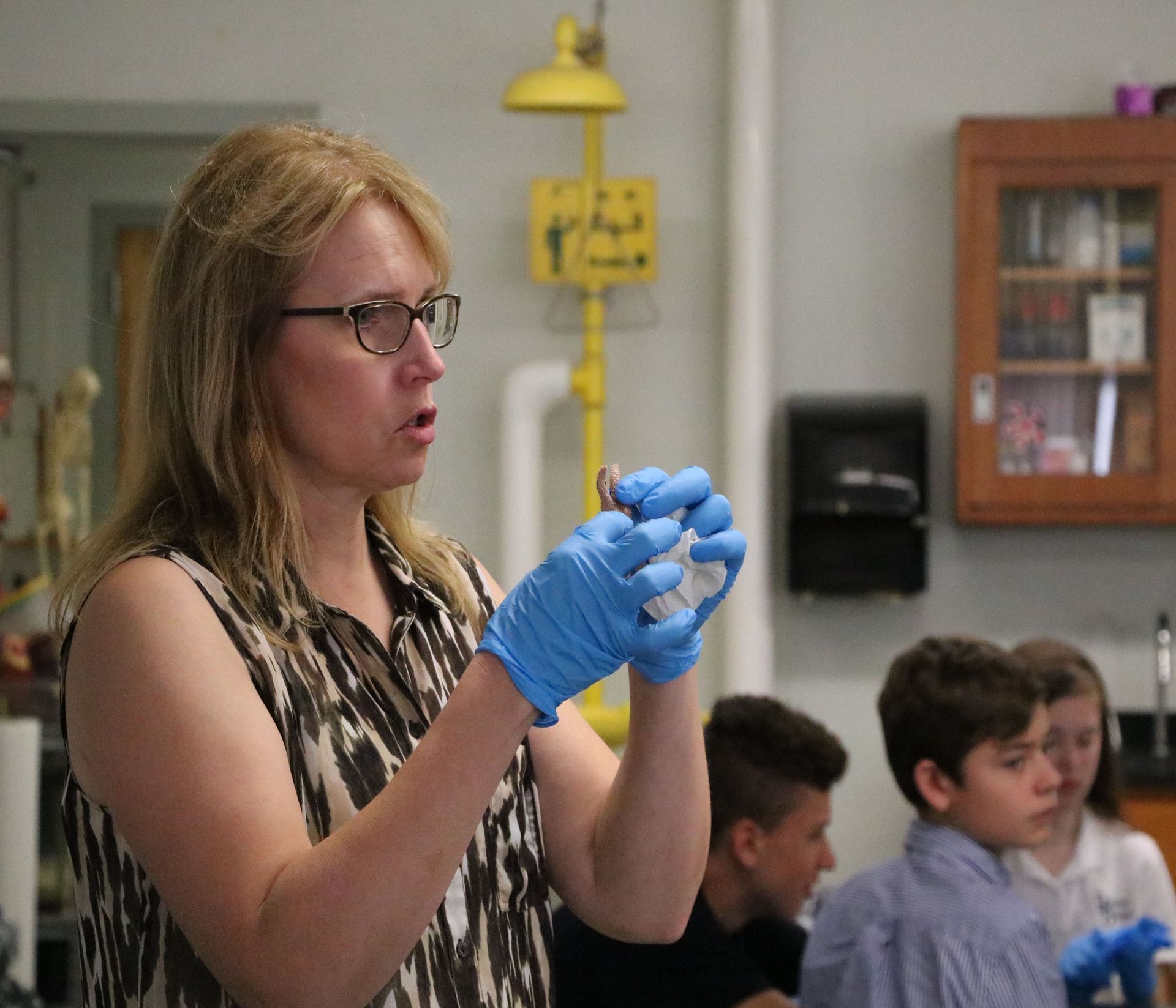 teacher giving lesson in classroom 