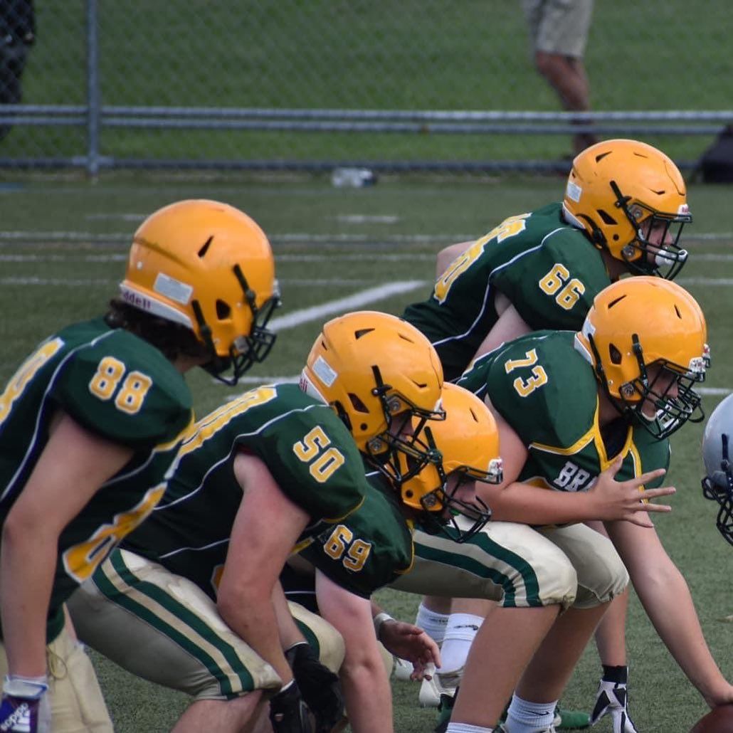 image of football players on a field 