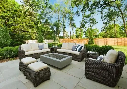 Outdoor Living at its Finest: Concrete Paver Patio with Cozy Seating in Sunny Anderson's Bay.