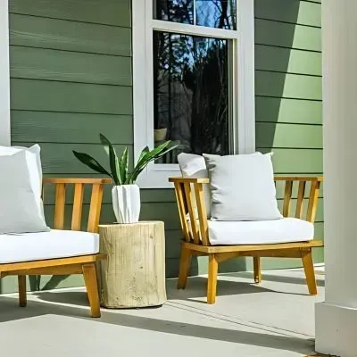 Curb Appeal & Warm Welcomes: Inviting Concrete Porch Enhances a Ravensbourne Home.