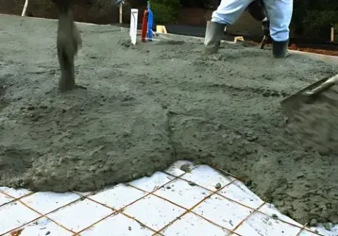 Dunners Concrete layers are pouring cement for a large foundation in Wakari.