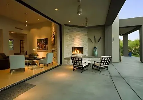 Stylish & Spacious: Modern Concrete Patio and Porch Enhance a Seaview Residence.