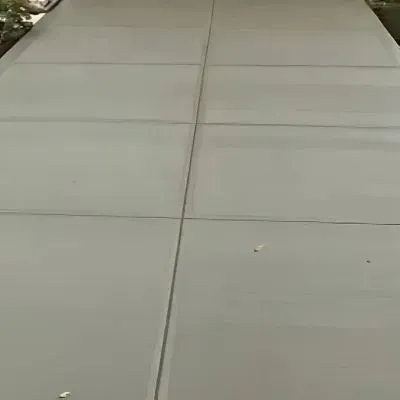 Broom finish concrete driveway in South Dunedin.