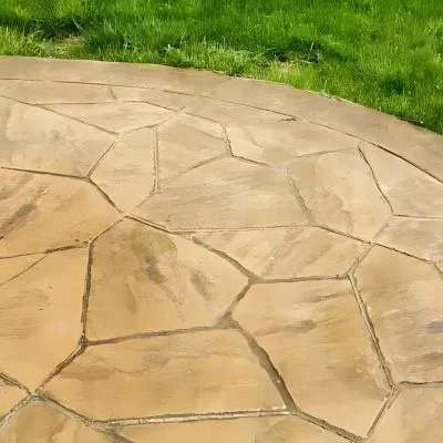 Natural Beauty, Concrete Durability: Stamped Concrete Patio Mimics Stone in Sawyers Bay.