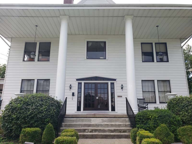 Several photos of exterior and interior of Tredway Funeral Home in Norwood, OH