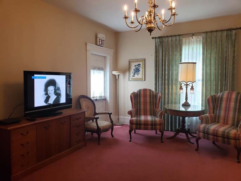 Several photos of exterior and interior of Tredway Funeral Home in Norwood, OH