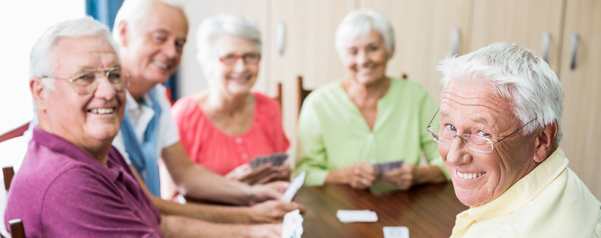 Memory Care Patients Playing Cards in San Leandro, CA