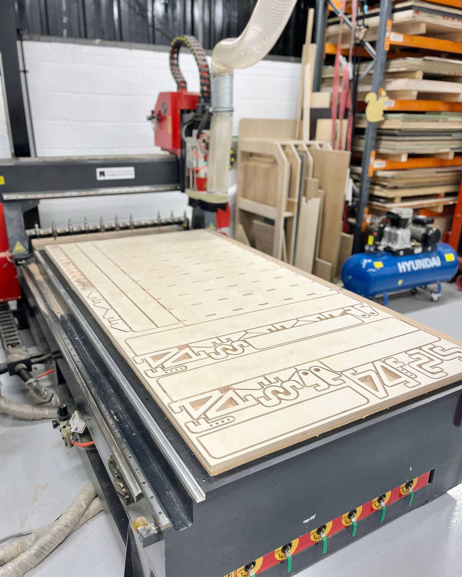 CNC router cutting birch ply parts