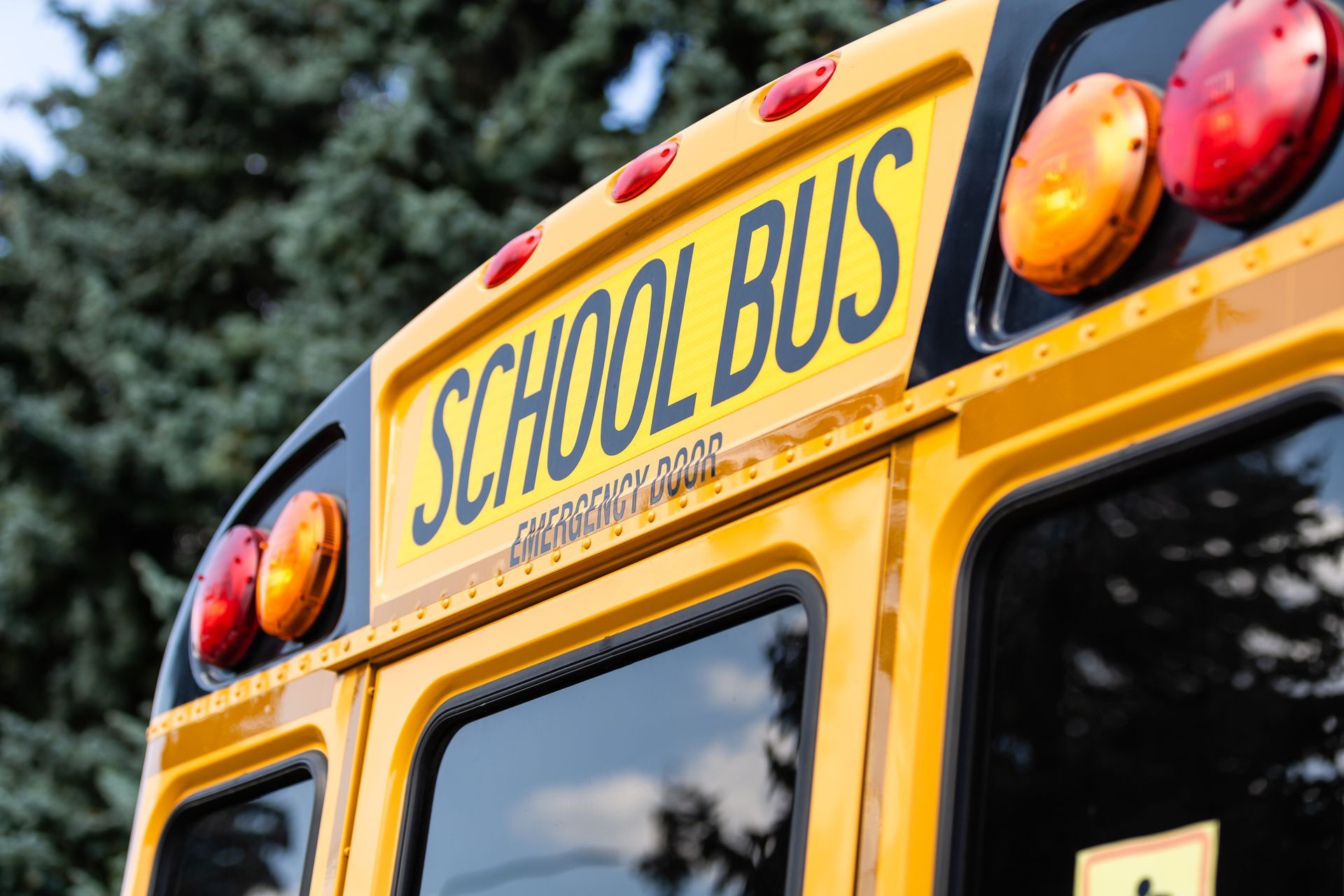 Yellow school bus rear with 