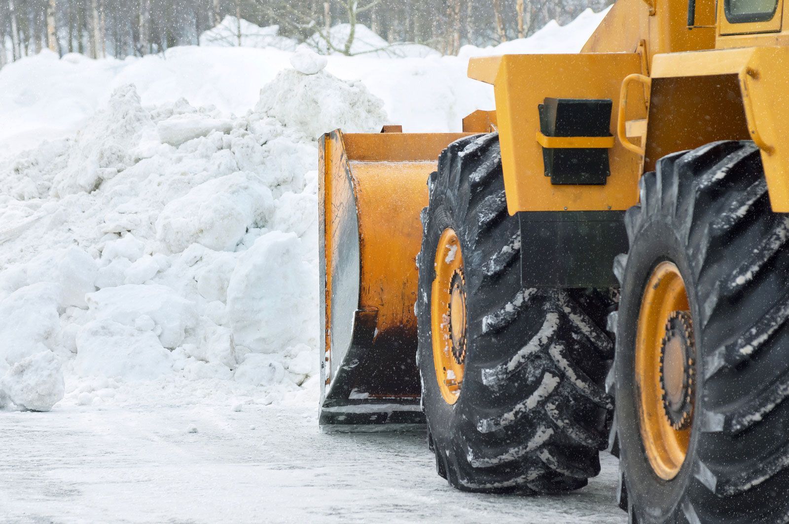 The Bulldozer Cleans The Snow — Stewartville, MN — Complete Outdoor Service LLC