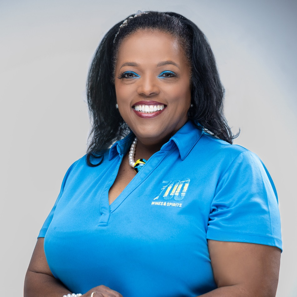 A woman wearing a blue shirt with the number 7 on it