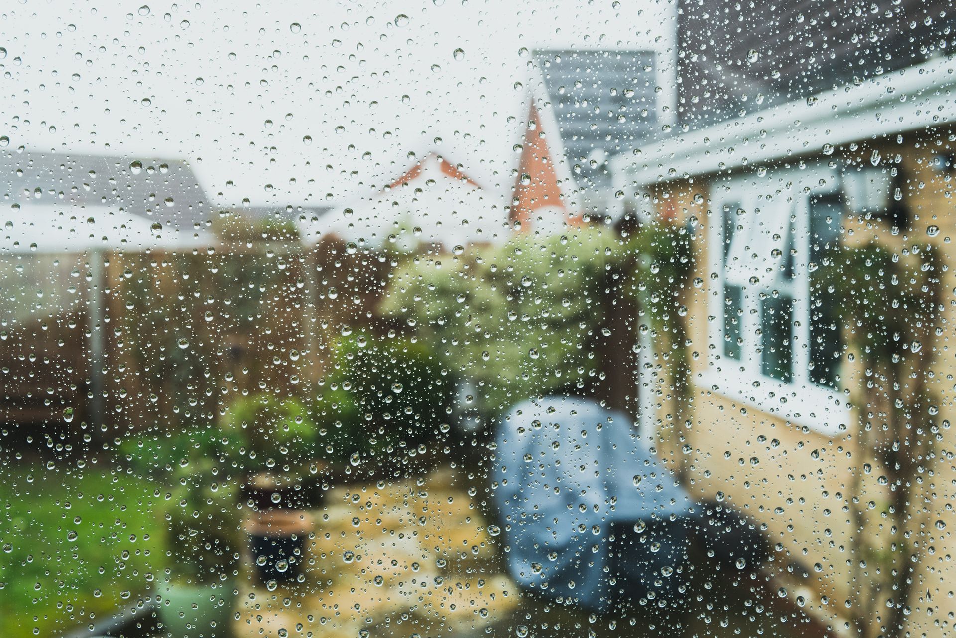 Raindrops On Window - Peoria, IL - McMahill & Sons Construction