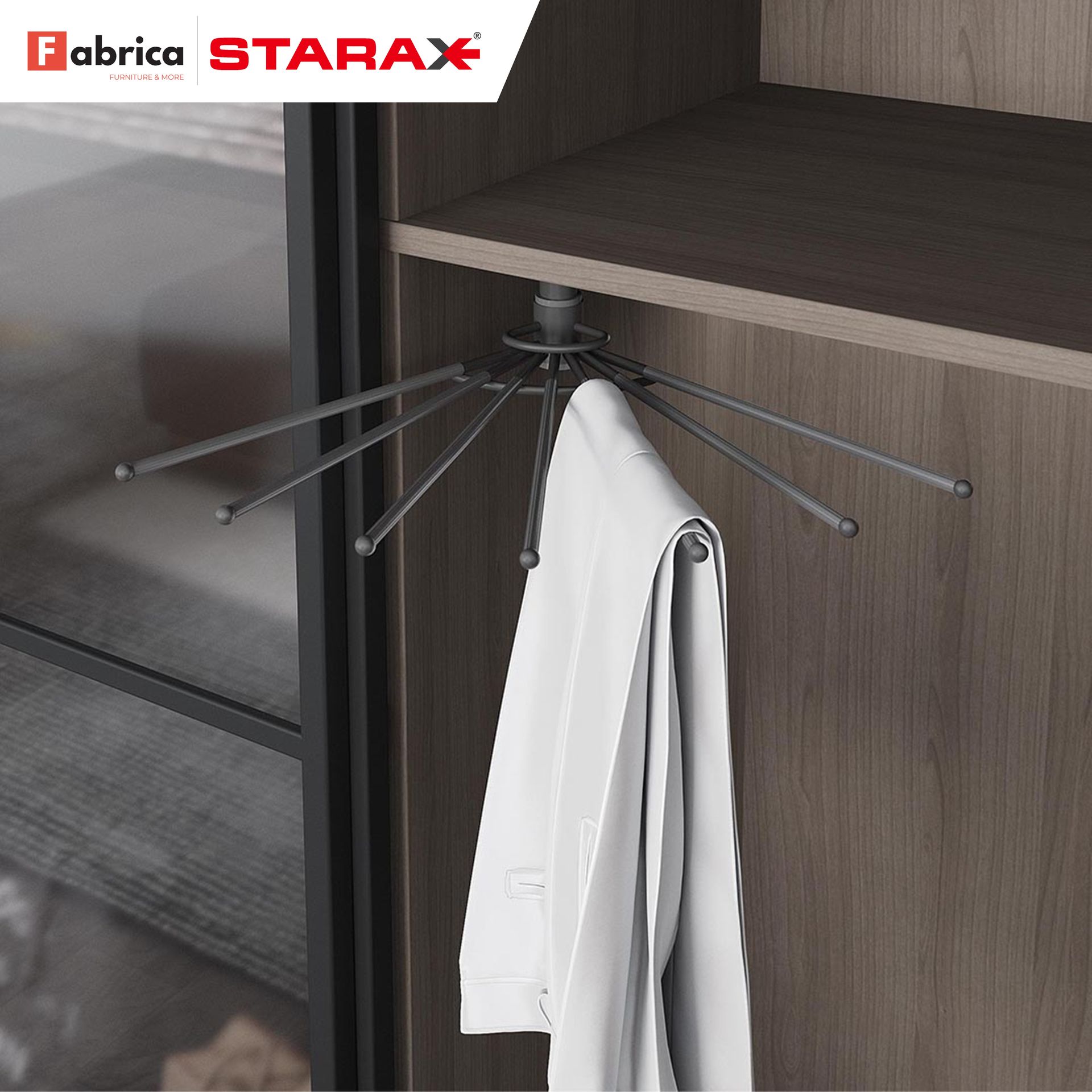 A white shirt is hanging on a clothes rack in a closet.