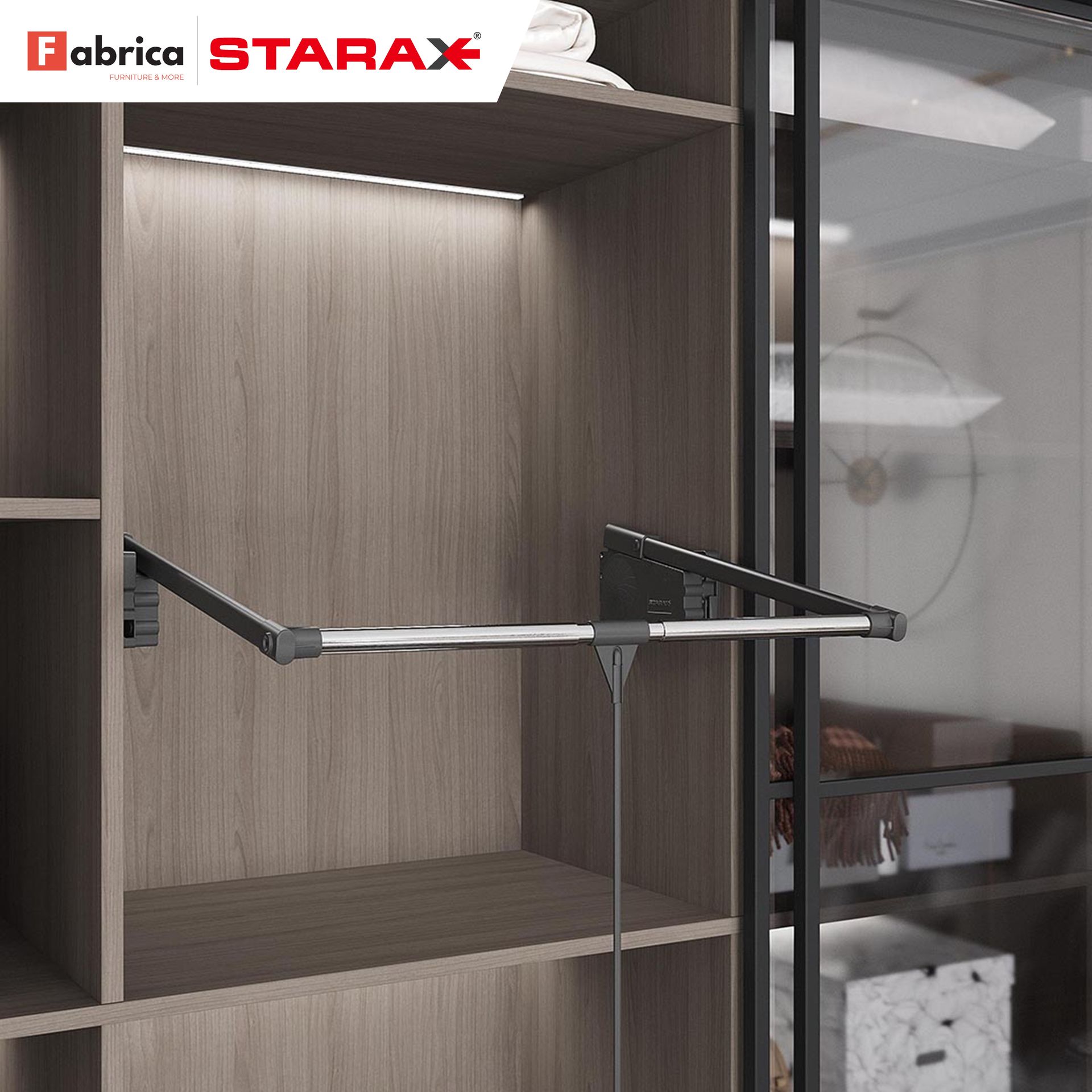 A picture of a wardrobe with a fabrica starax logo on it