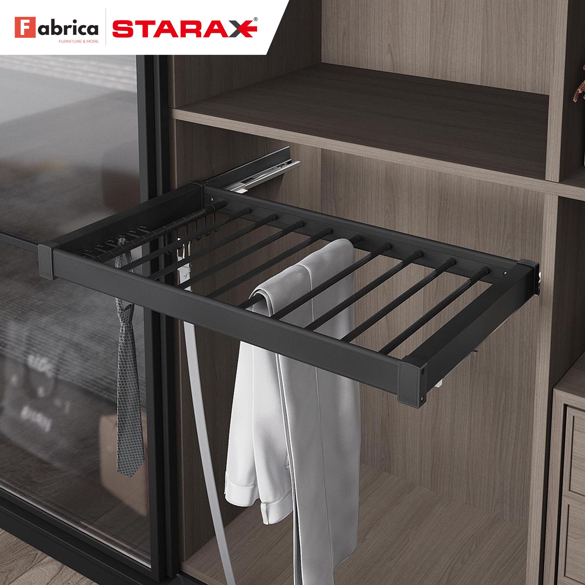 A sliding glass door with a fabrica starax logo on it