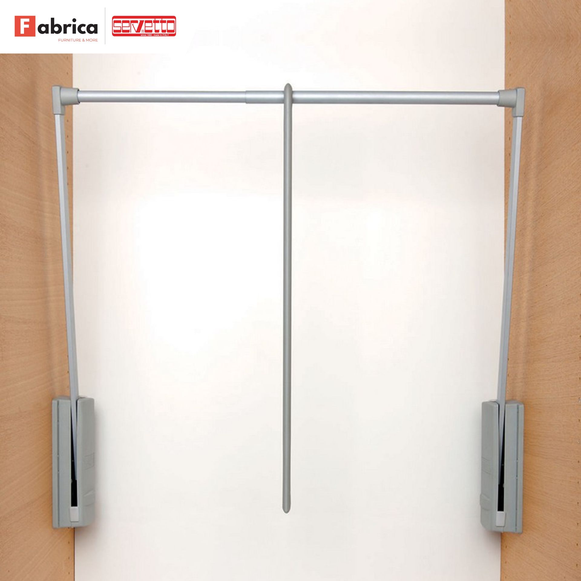 A picture of a fabrica clothes rack on a wall