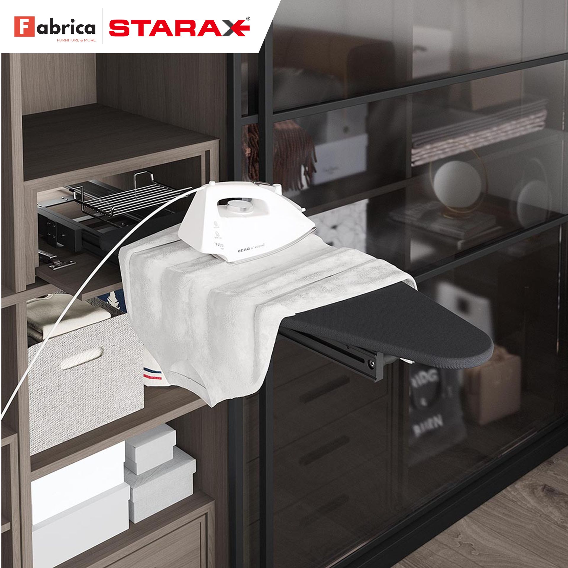 A fabrica starax ironing board with a towel on it