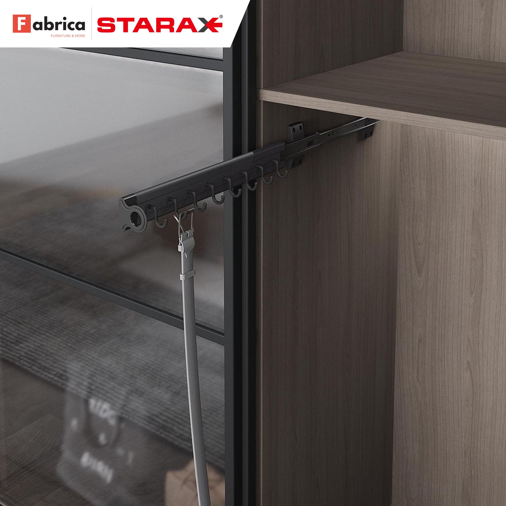 A picture of a tie rack in a closet.