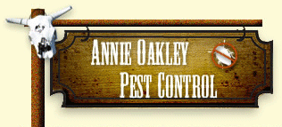 Sign for Annie Oakley Pest Control with a steer skull.
