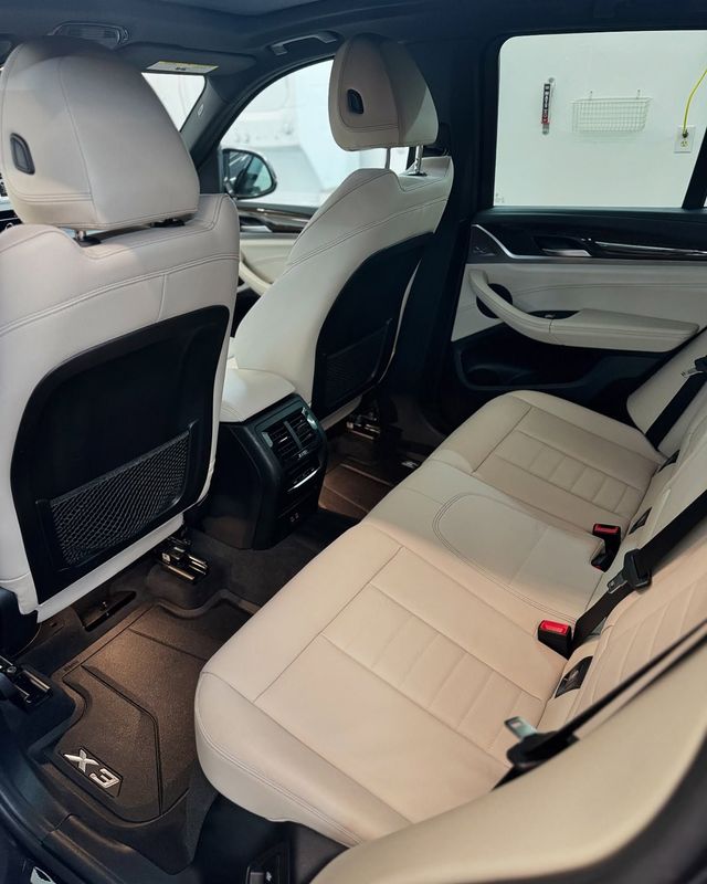 Finished interior — clean rear seats in a BMW X3