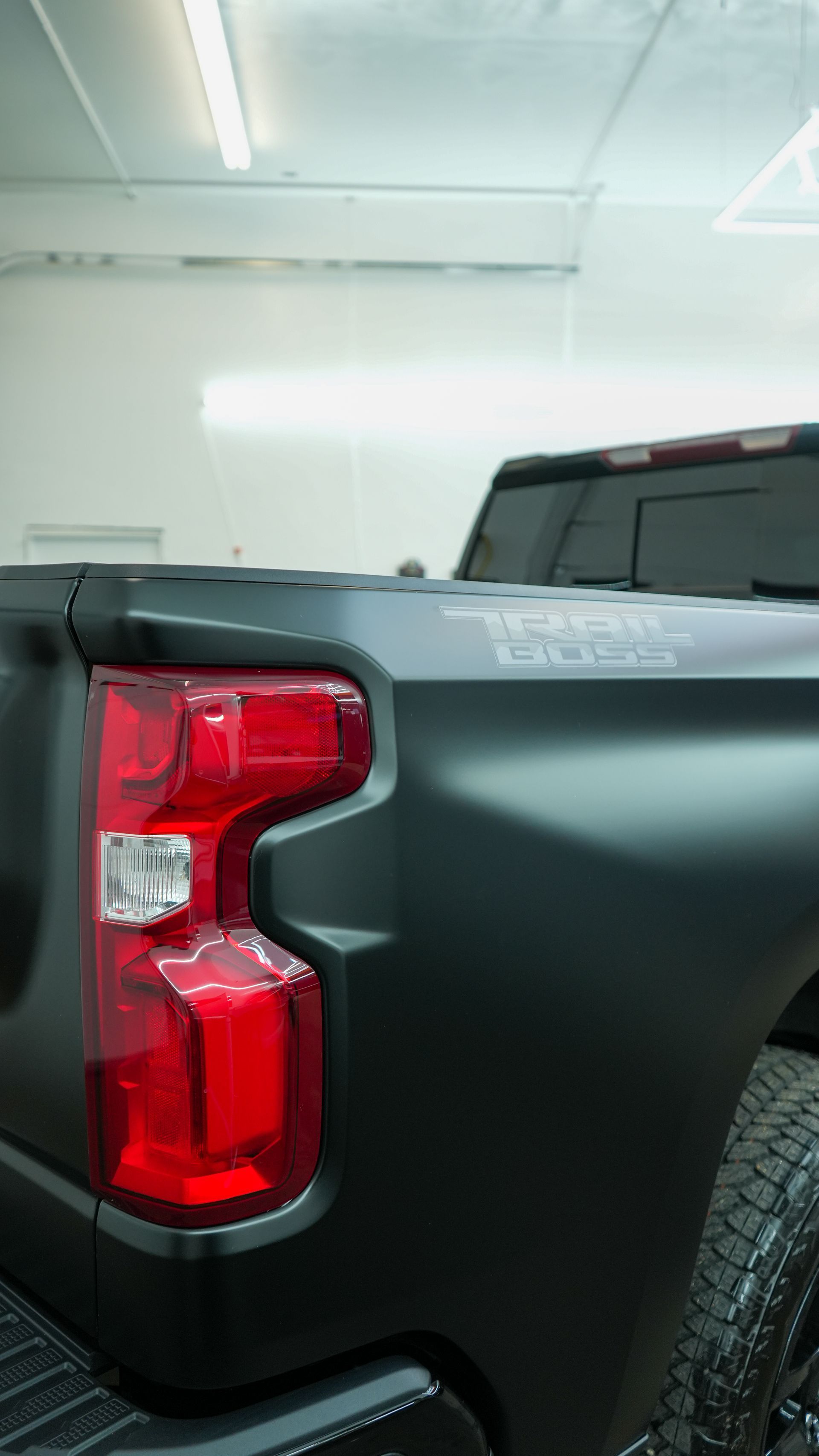 Detailed truck bed and tail light close-up