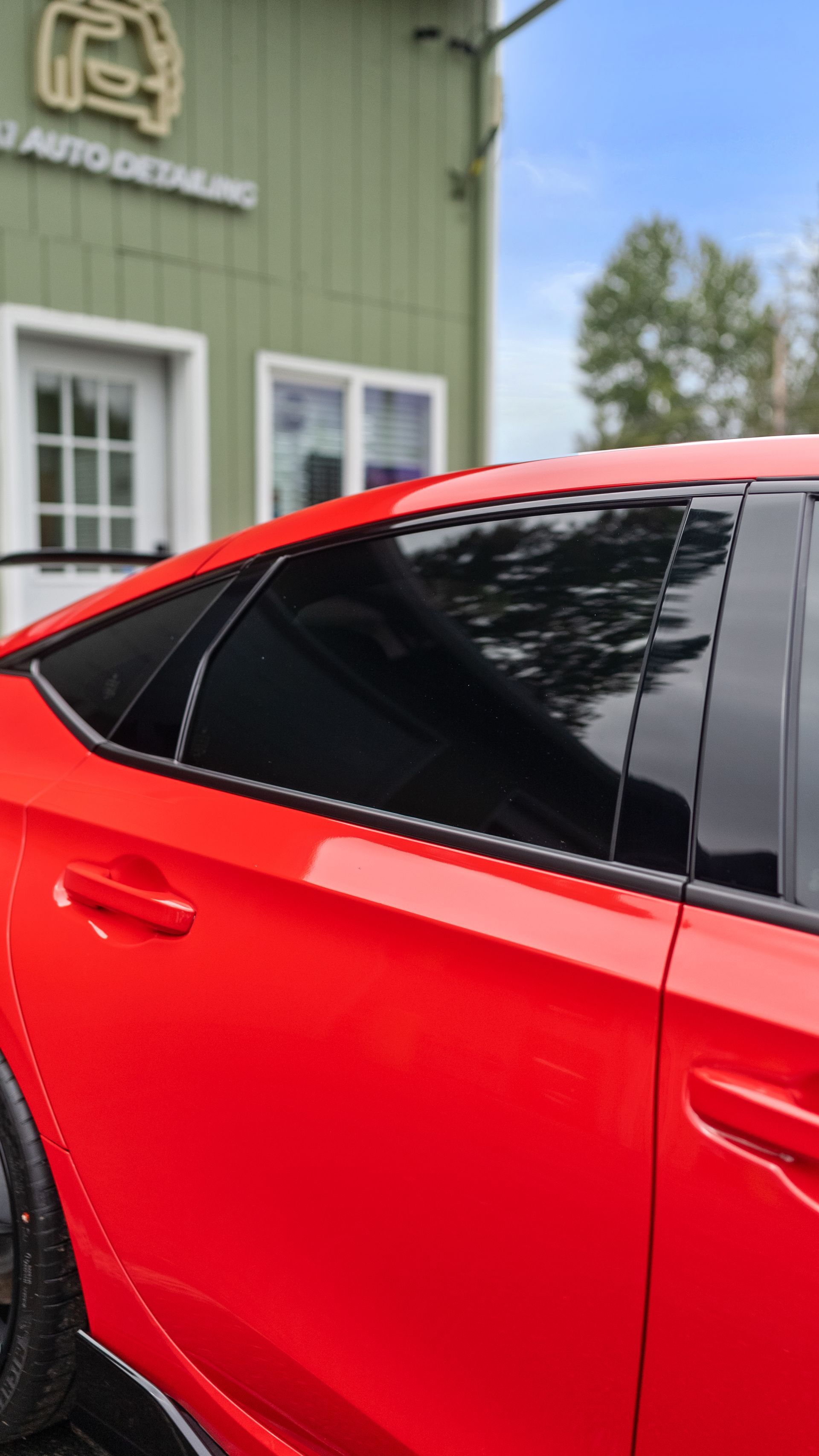 Window tint applied to a door glass