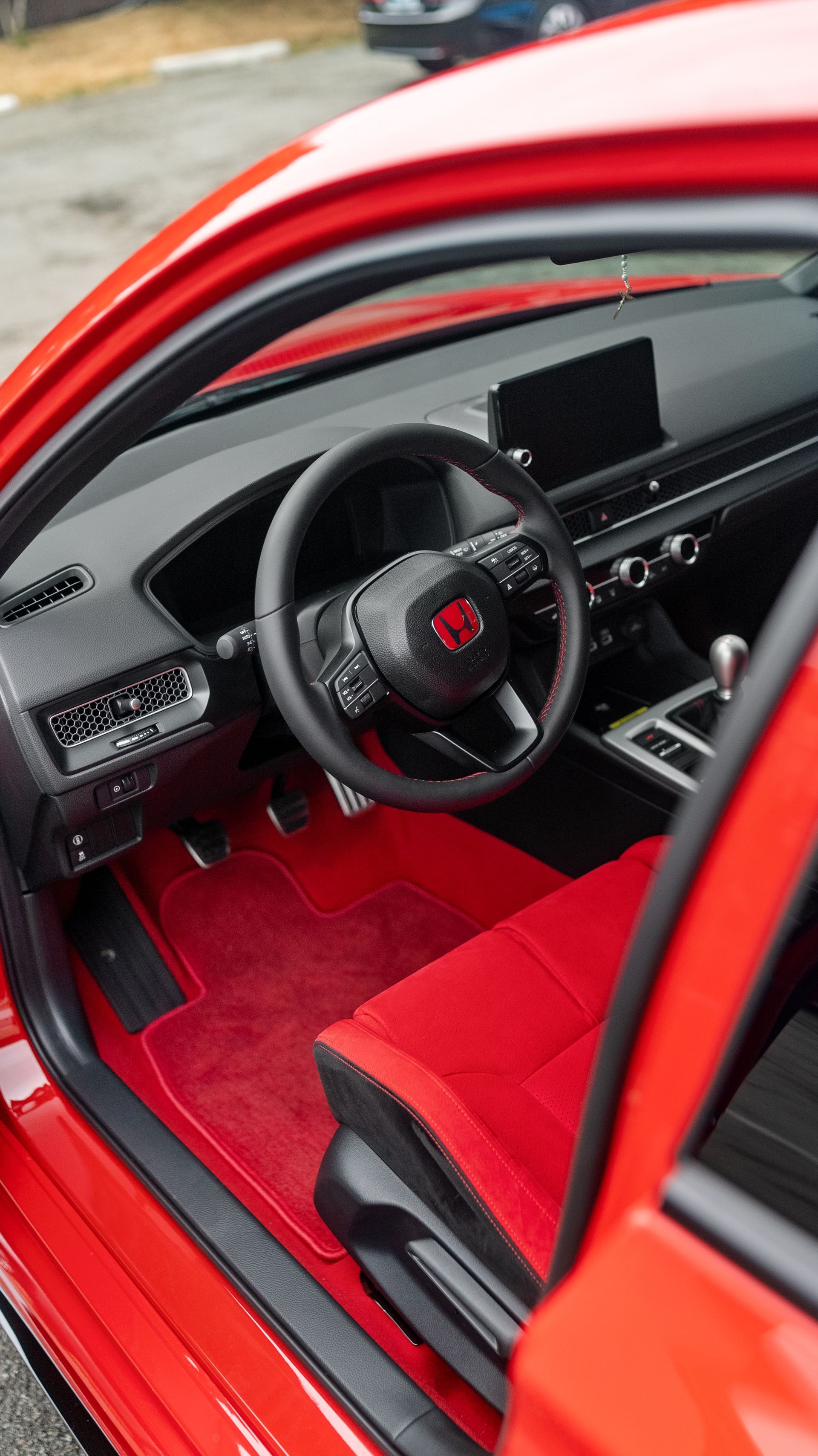 Freshly detailed Honda Civic Type R interior with red seats, cleaned by A1 Auto Detailing in Lynnwood