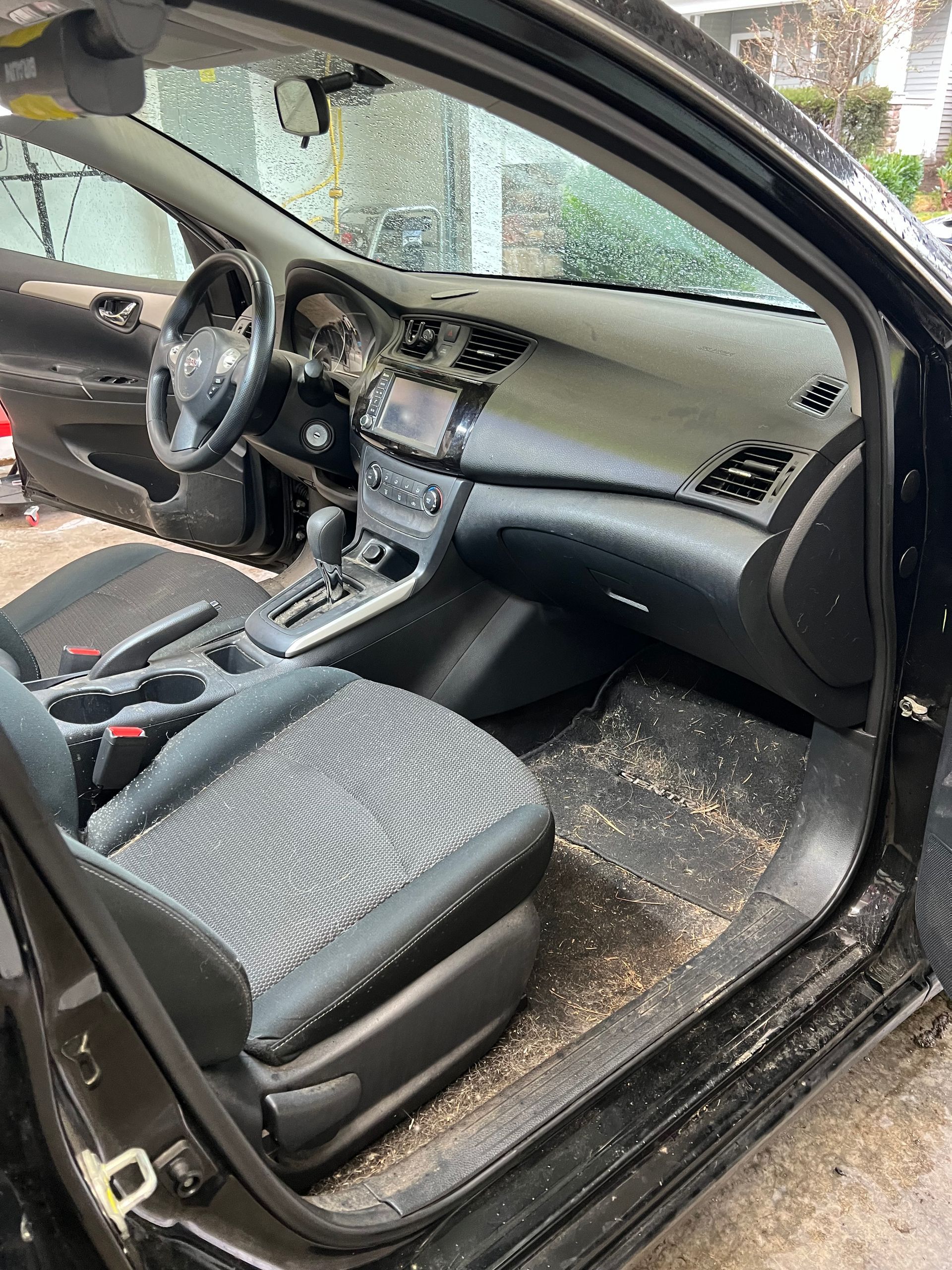 Smoke residue and debris through the cabin of a customer vehicle before our odor removal service