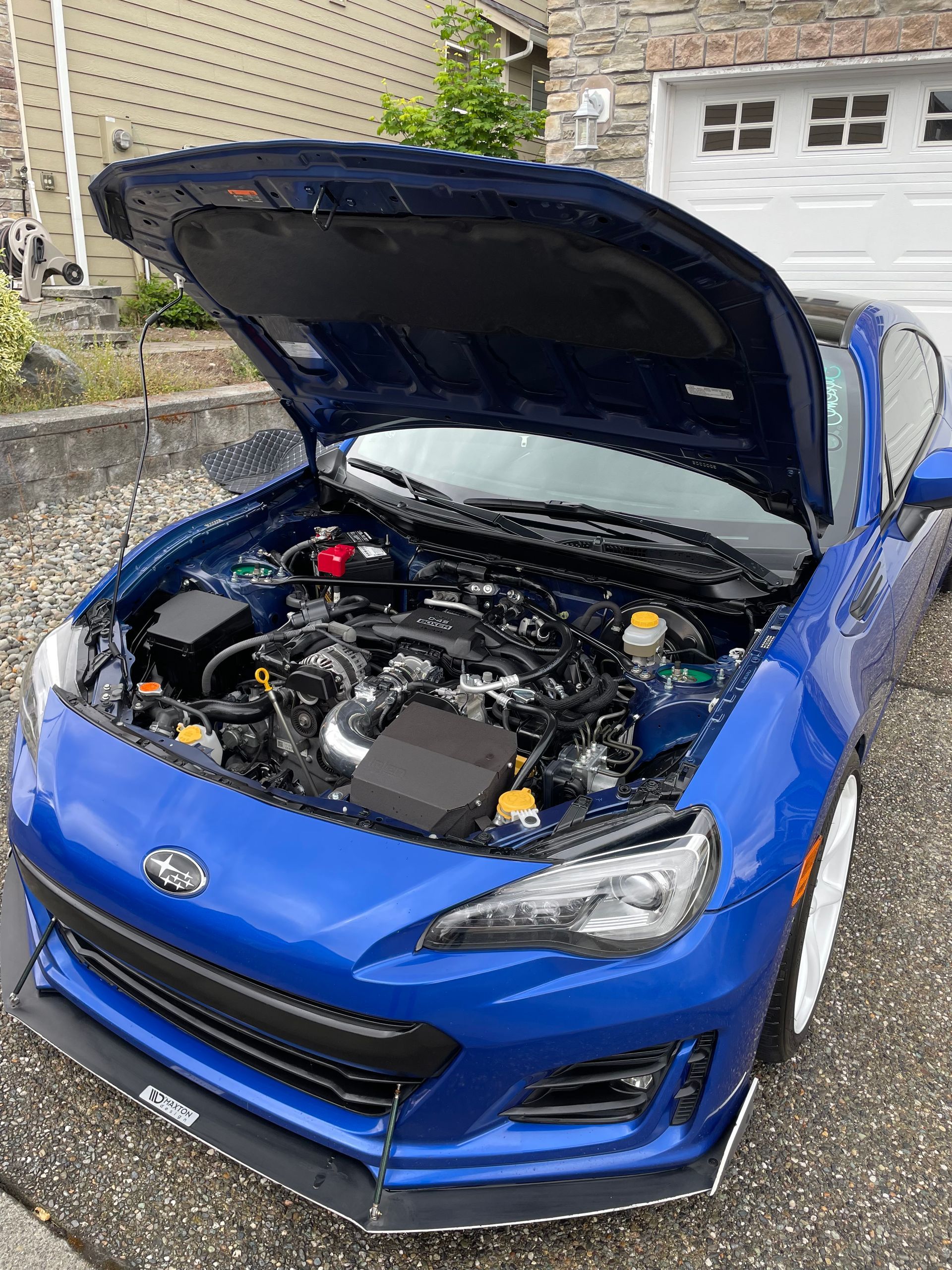 Engine bay detailed on a blue Subaru at A1 Auto Detailing in Lynnwood, WA