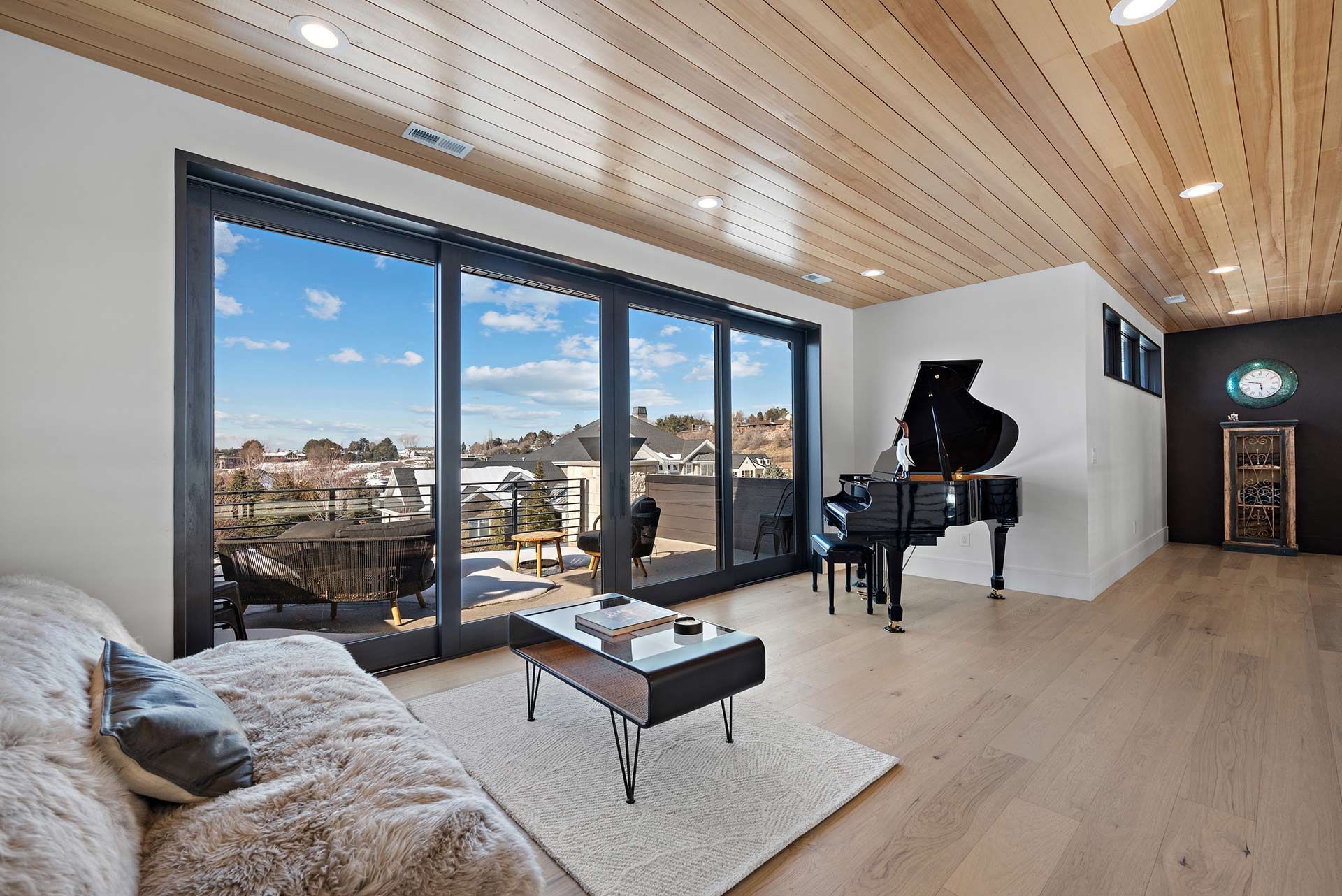 A Living Room with Piano and Couch