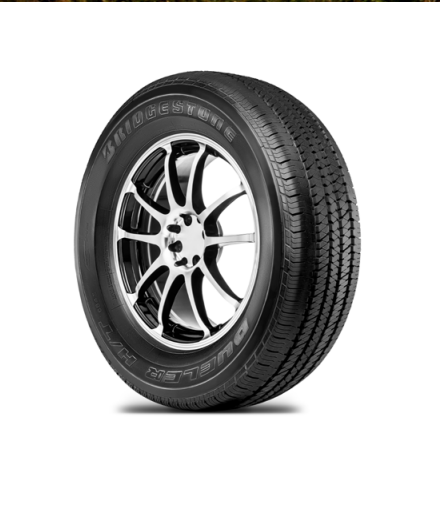 Neumático negro sobre llanta plateada y negra.