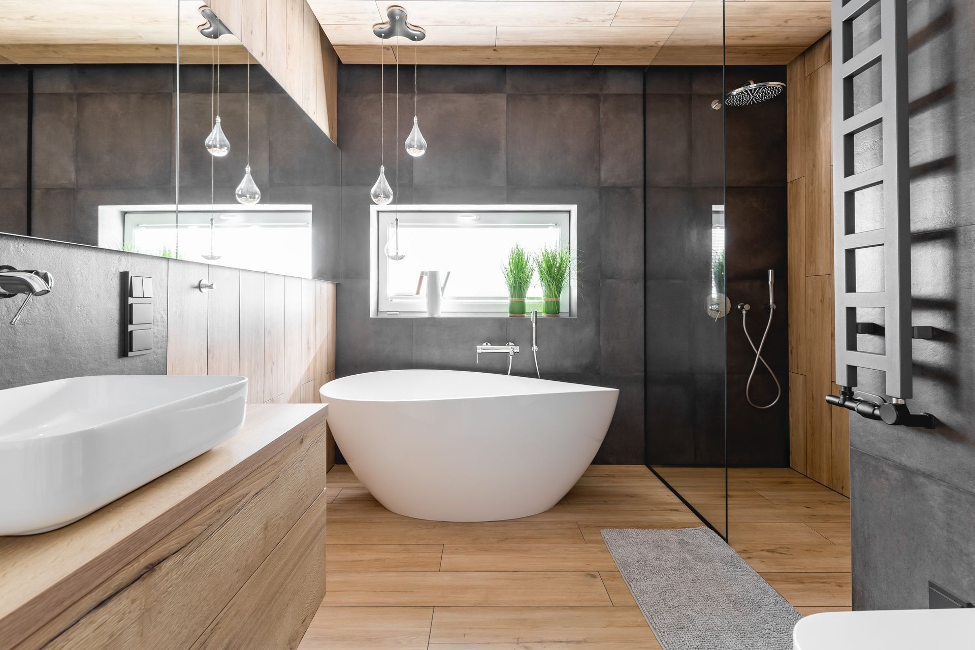 bathroom with stand alone bathtub and upgraded bath fixtures