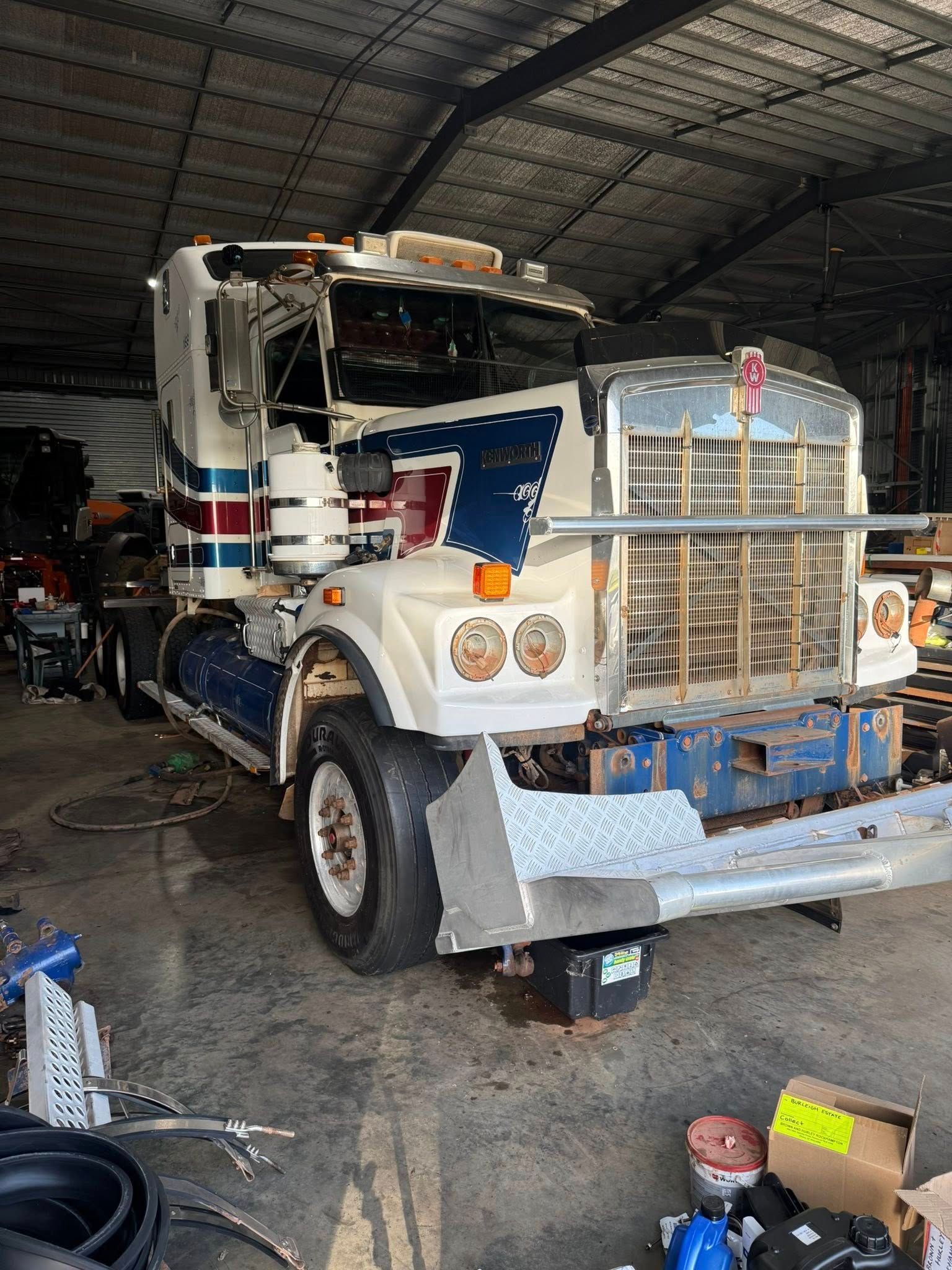 A White Kenworth Semi-truck With Blue — Full Torque Transport In Parkhurst, QLD