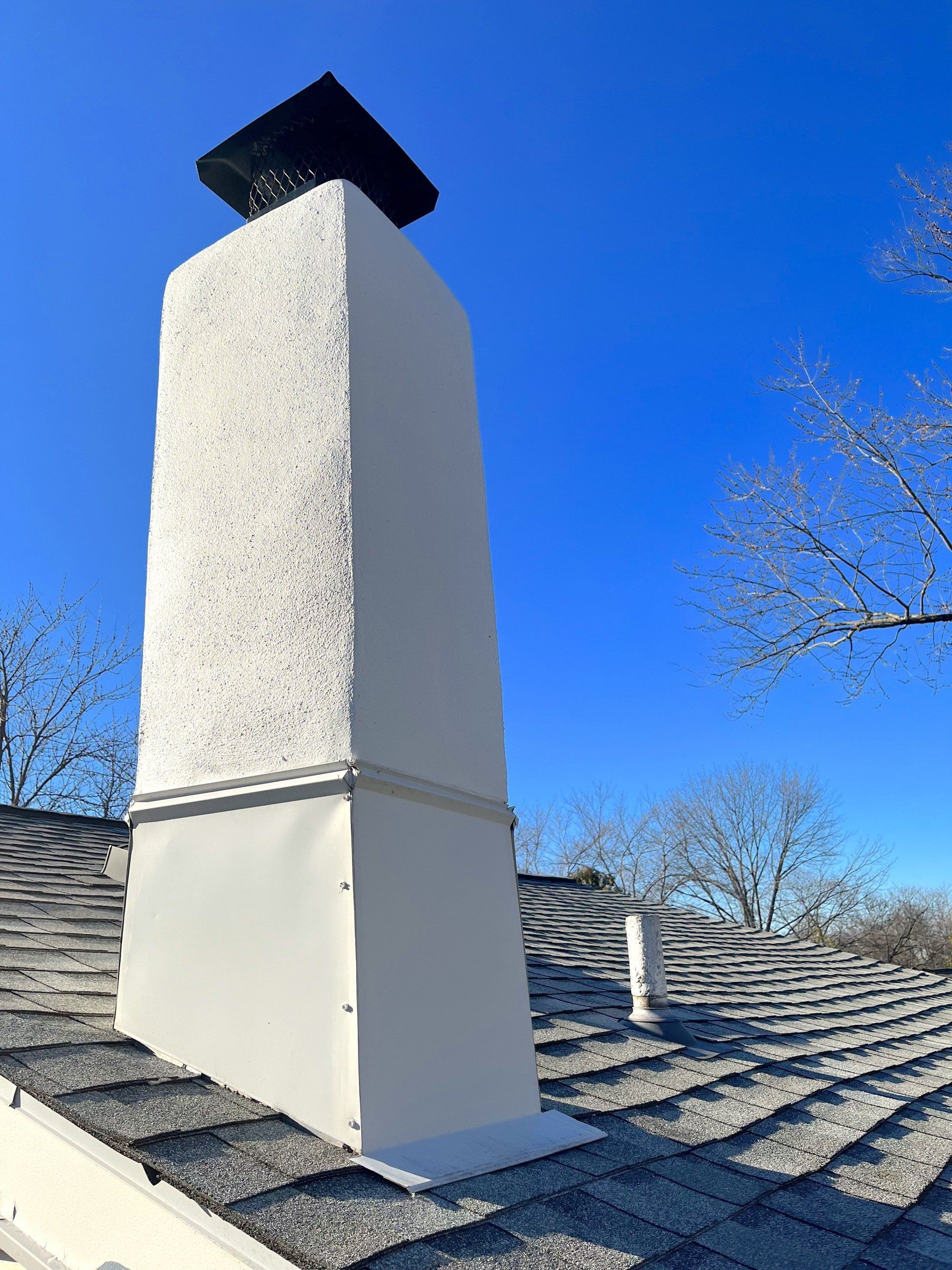 Large White Stucco Chimney