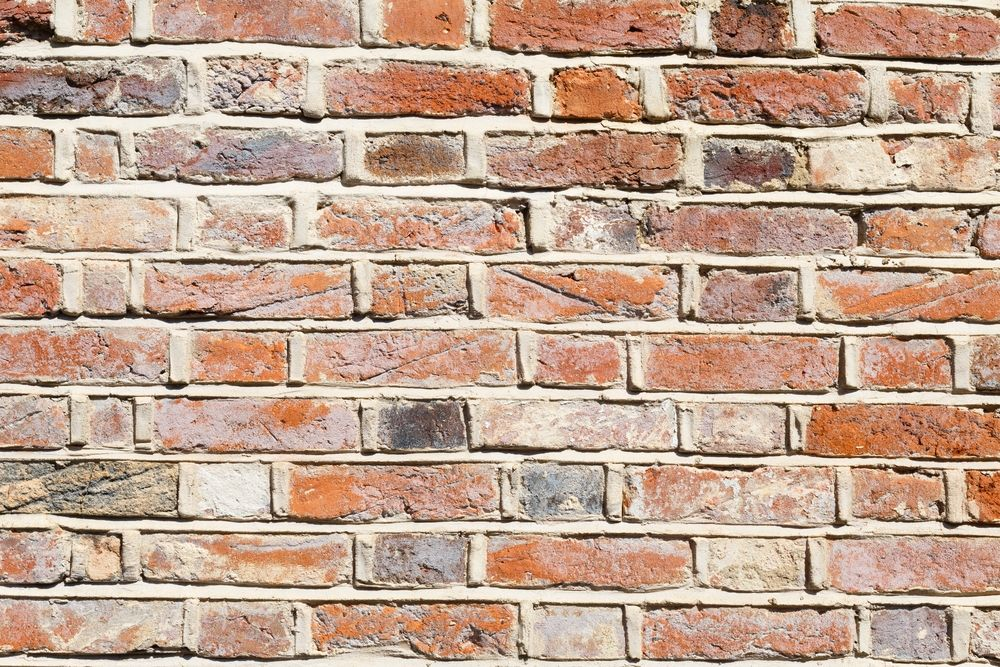 Lime Mortar vs. Modern Cement: Why Using the Wrong Mortar Will Destroy Historic Brickwork