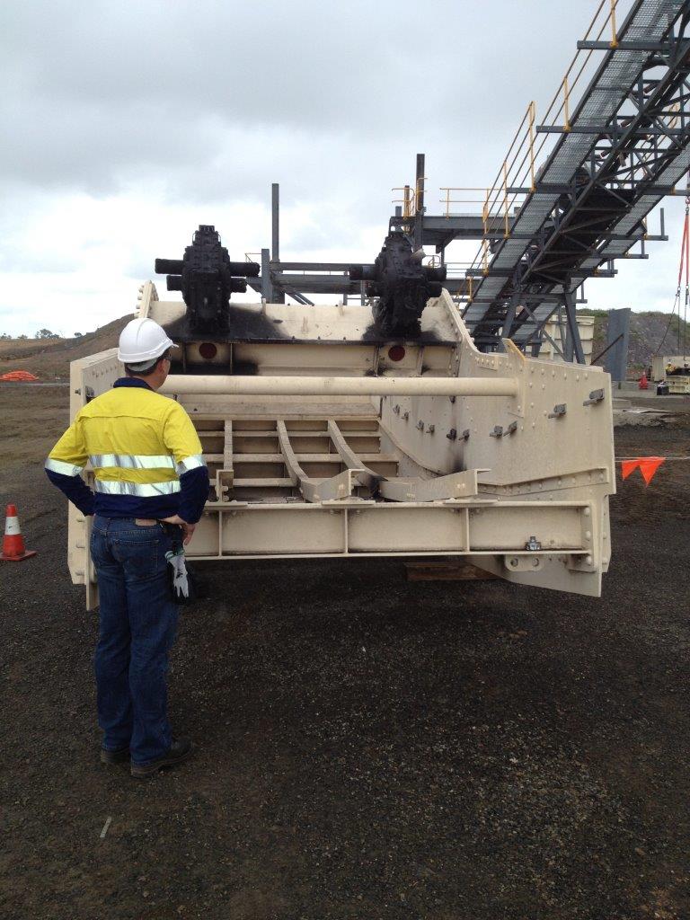 Worker Checking Safety of Mining Machinery — Business Support Services Near Bowen, QLD