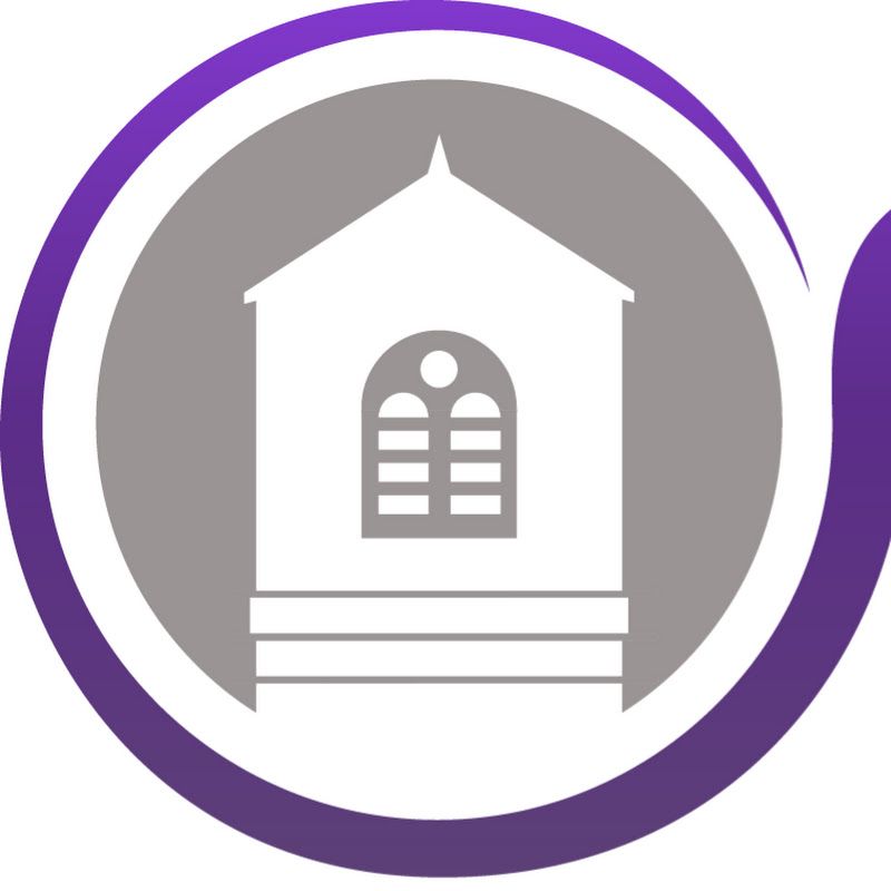 A white house with a window in a purple circle.