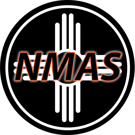A black circular logo featuring the white Zia sun symbol with the letters 