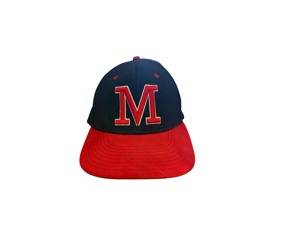 A navy blue baseball cap with a red brim and a large red capital letter 